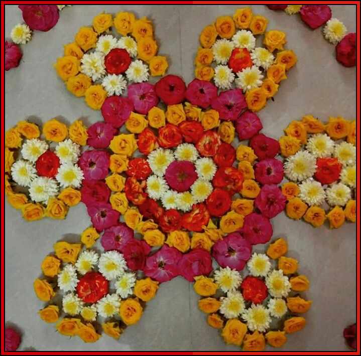 small rangoli with flowers
